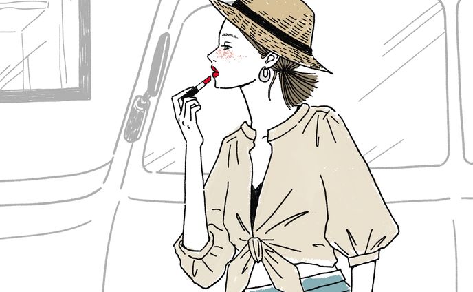 線画とカラー　メイク直しする女性