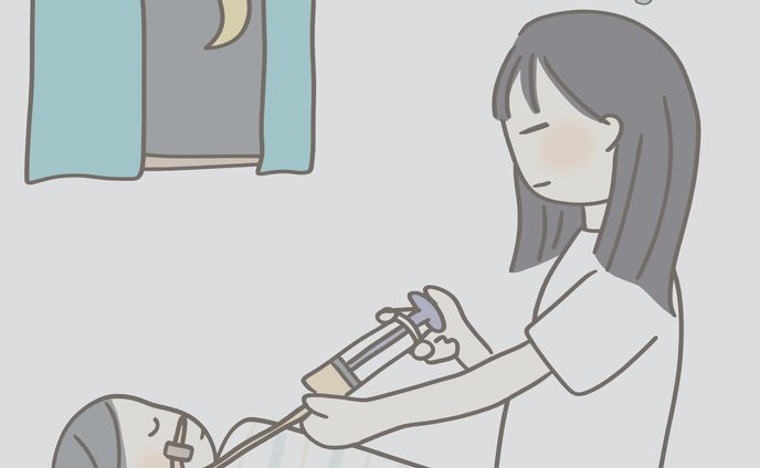 夜間の注入をするママ