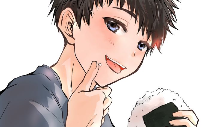 おにぎりを食べている男の子