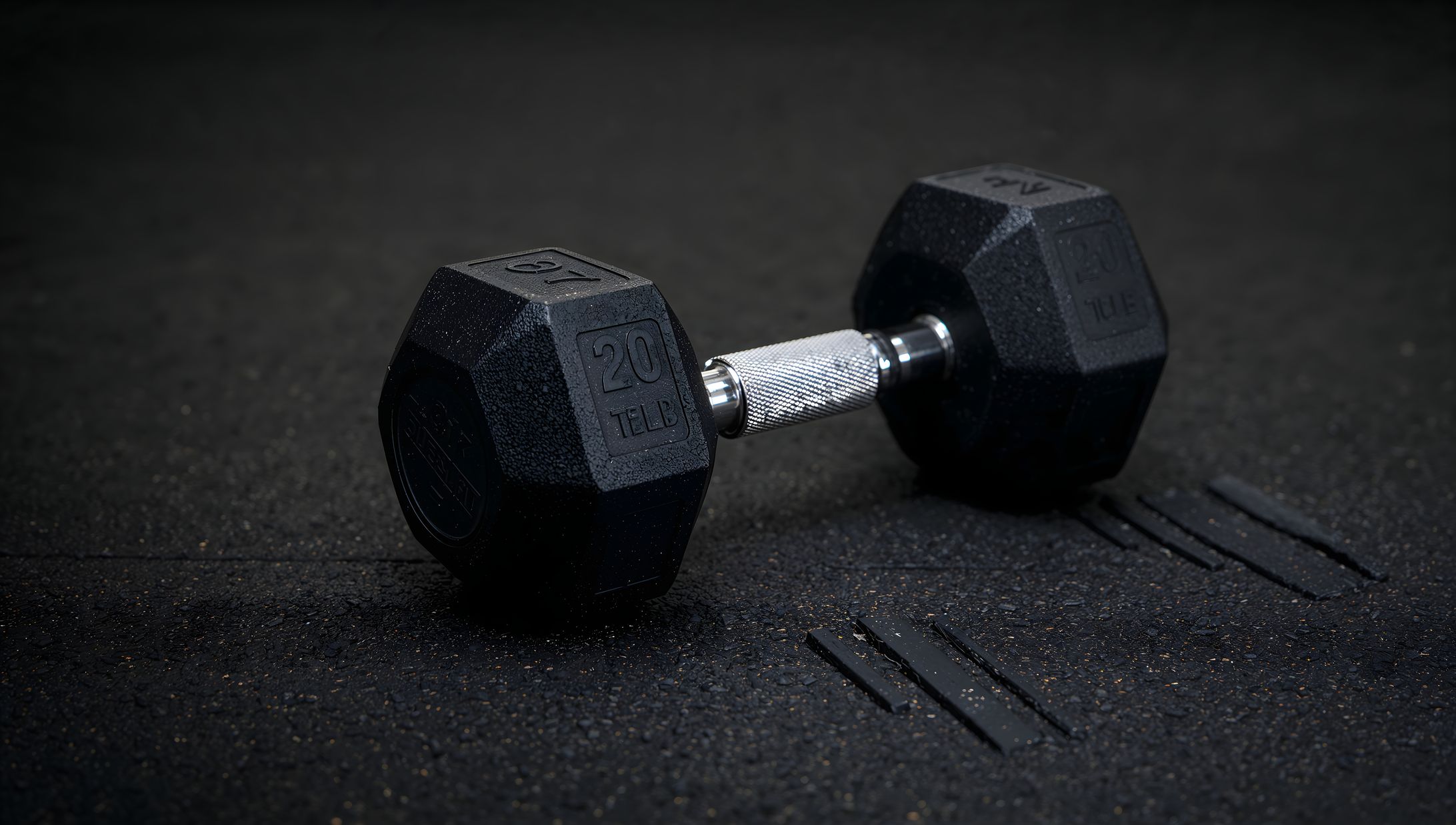 dumbbell fitness training gym dark floor closeup (1)-1