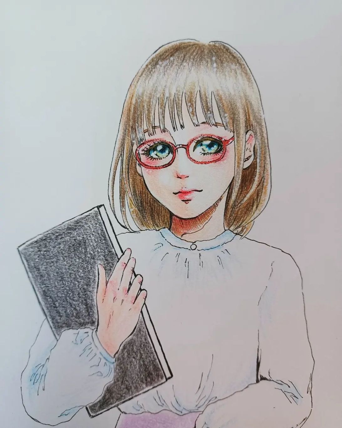 小野田 咲】と申します。 21歳の女子大生です。 手に持っているのは