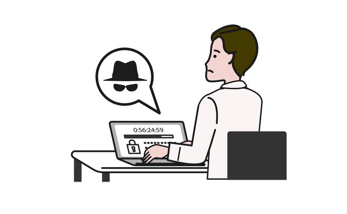 スパイウェアに困った顔をするパソコンに向かう人 02